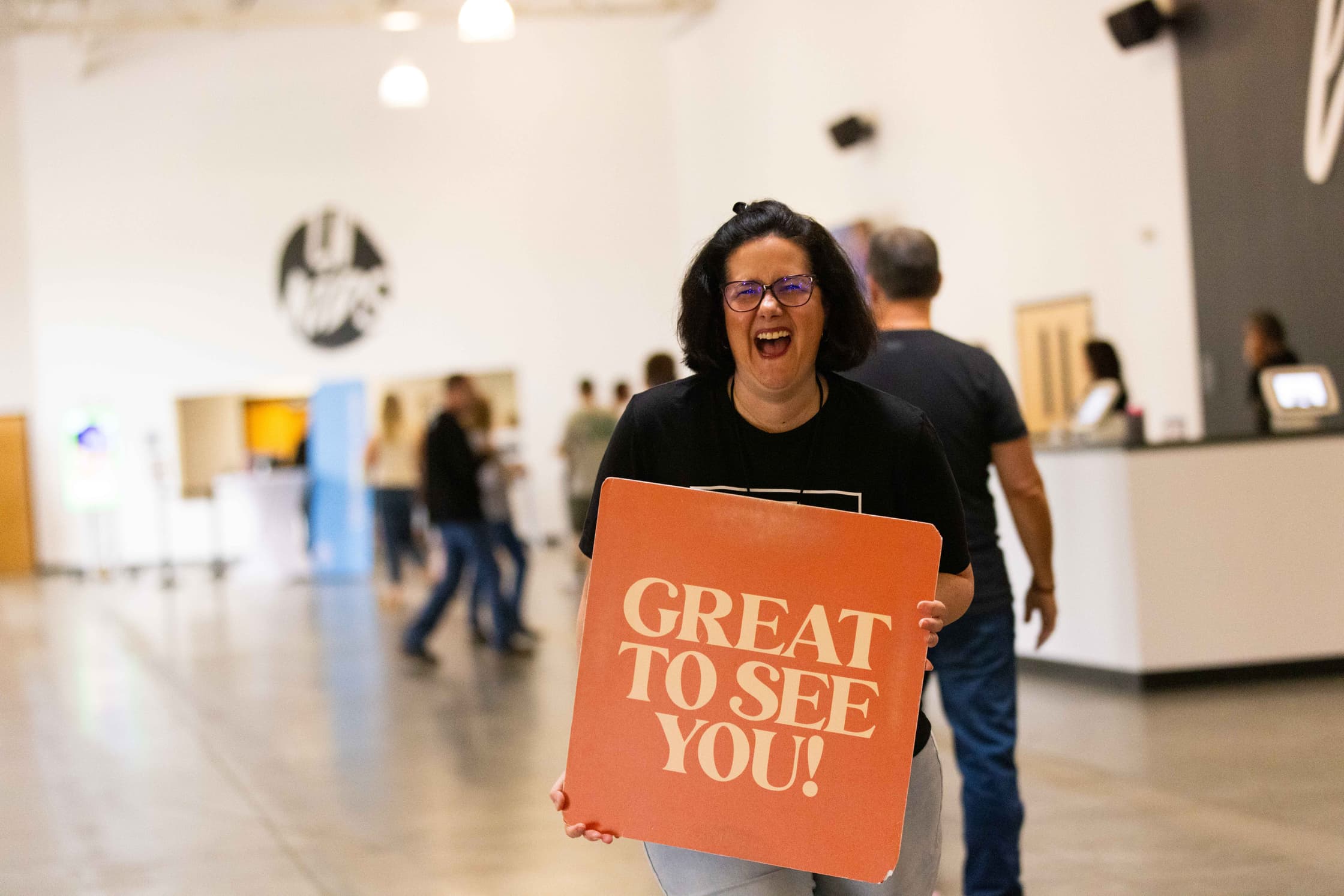 Photo of a greeter on the MVMT Team